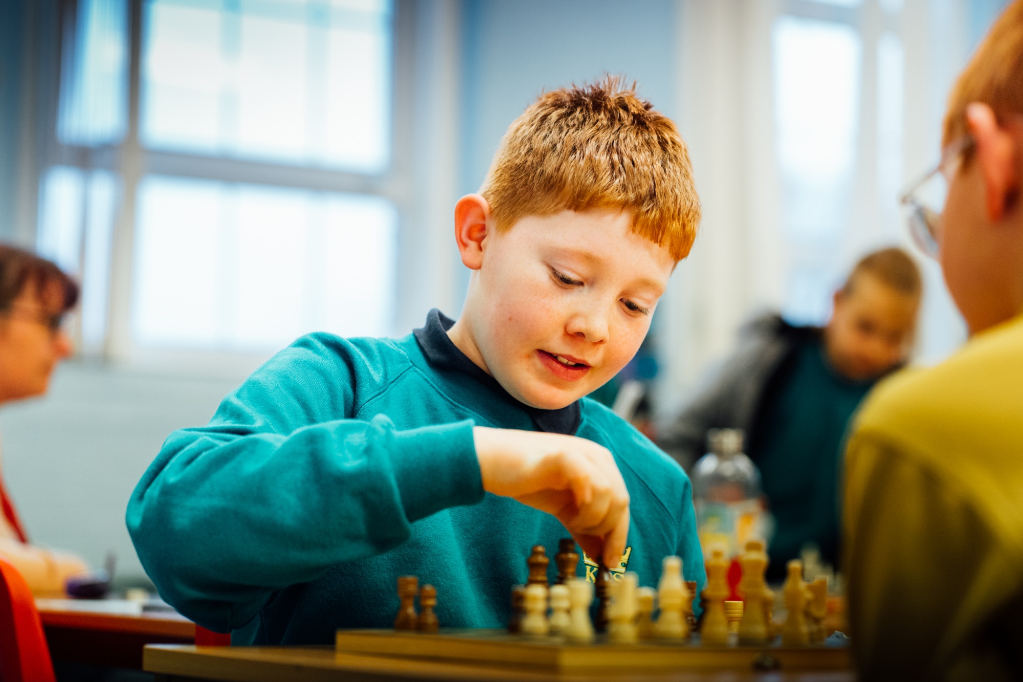 student playing chess