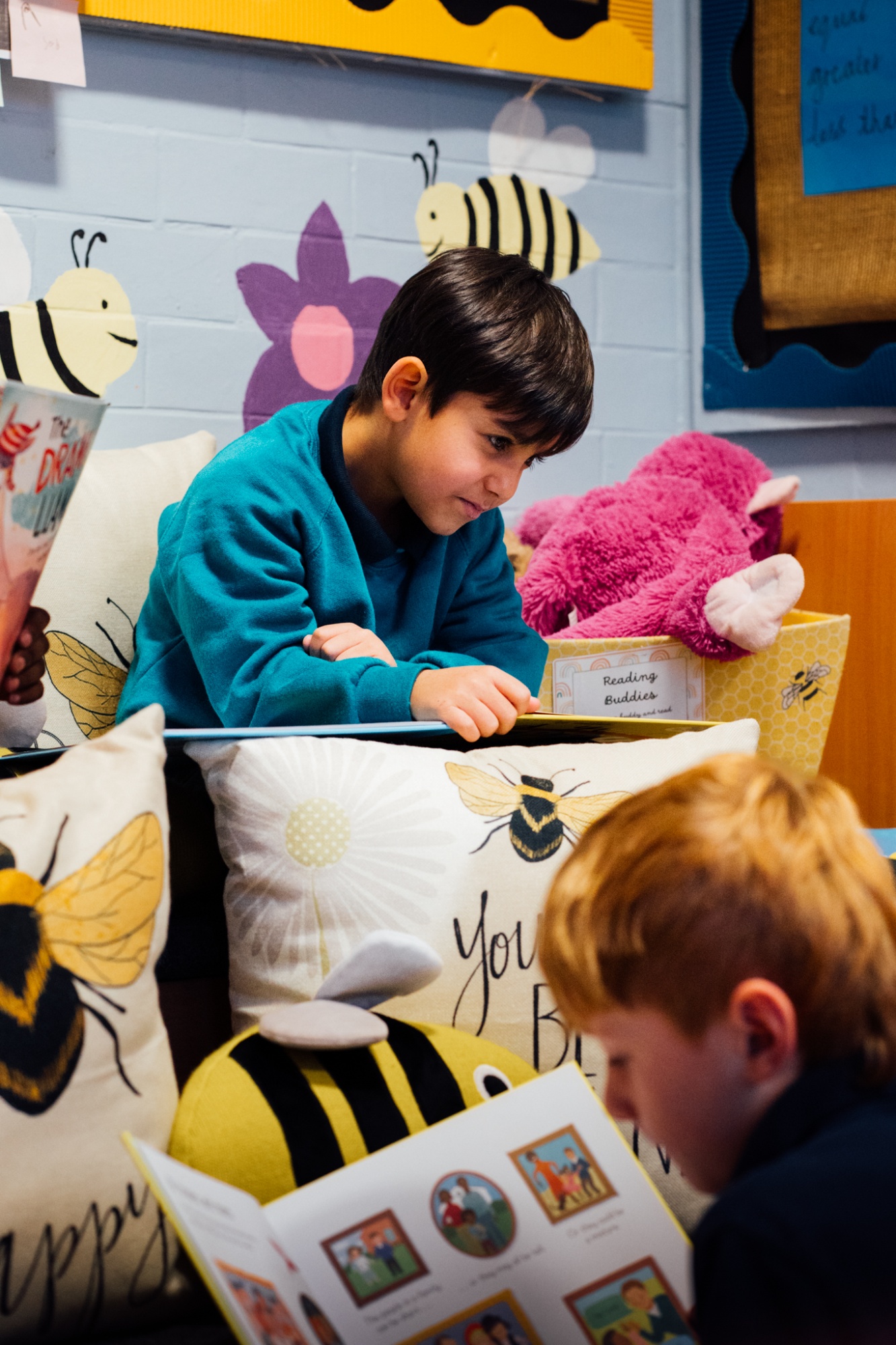 two students in the reading corner at breaktime